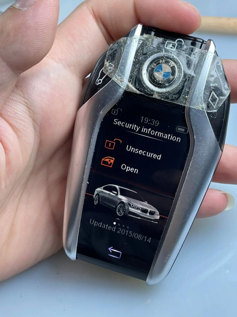 【宝马7系车钥匙图片,宝马七系的钥匙价格多少钱】